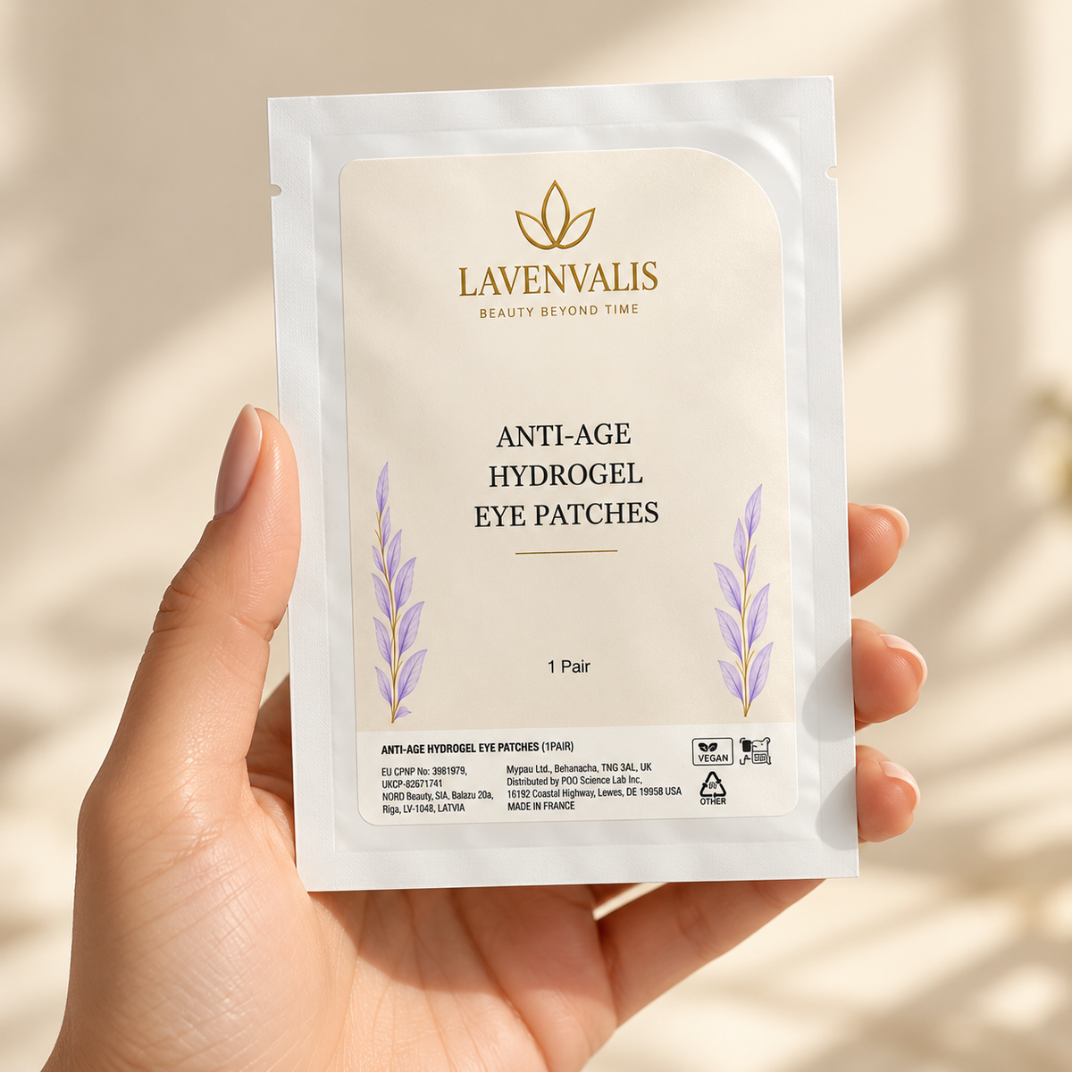 Lavenvalis Anti-Age Hydrogel Eye Patches — individual sachet held in hand