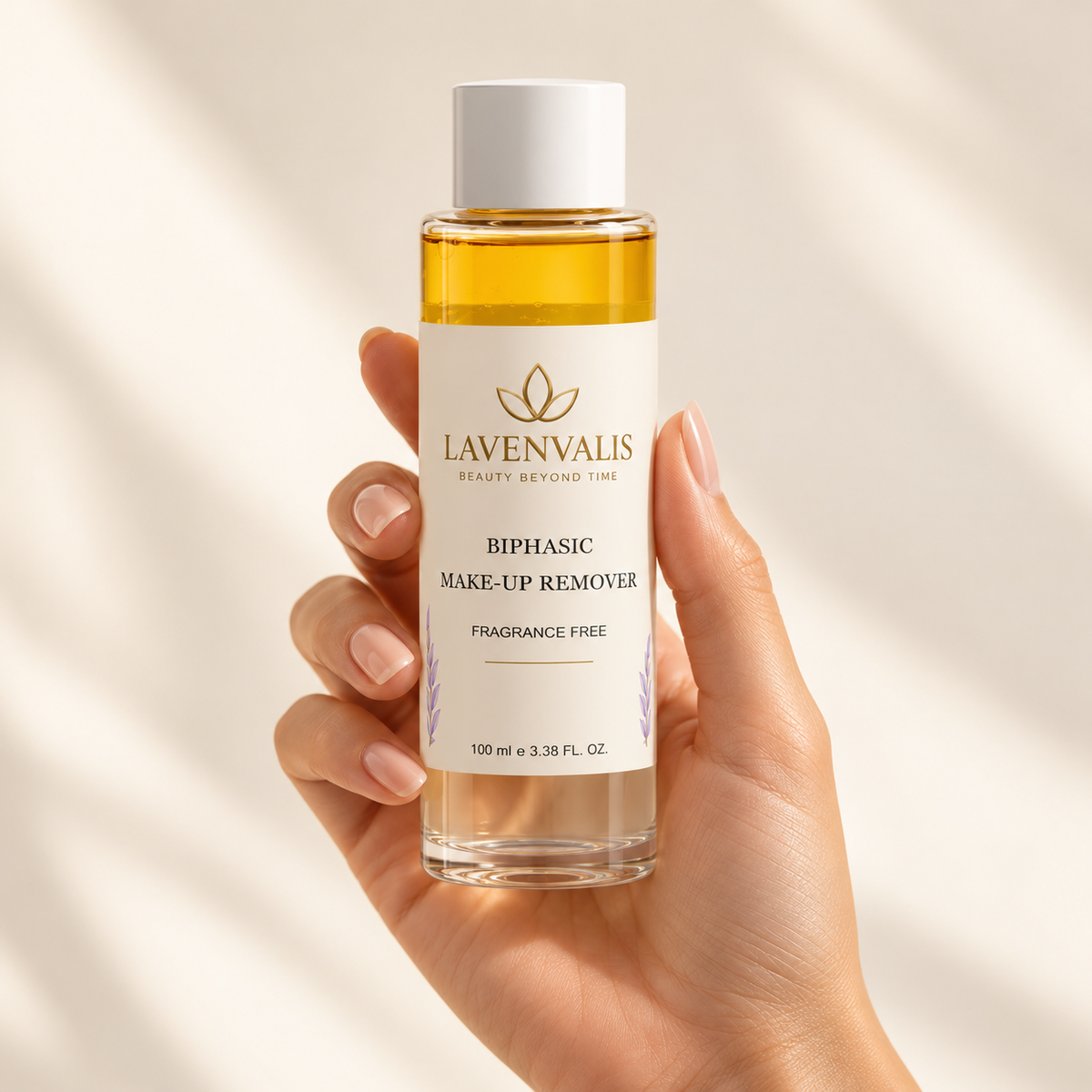 Lavenvalis BiPhasic Make-up Remover 100 ml — held in hand