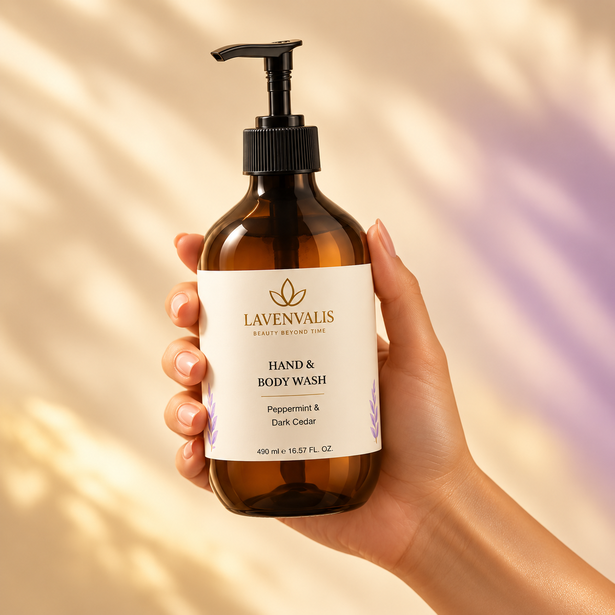Lavenvalis Hand & Body Wash Peppermint & Dark Cedar490ml — held in hand
